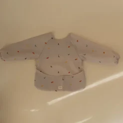 mushie Bavoir à Manches Dinos - 6/24 Mois